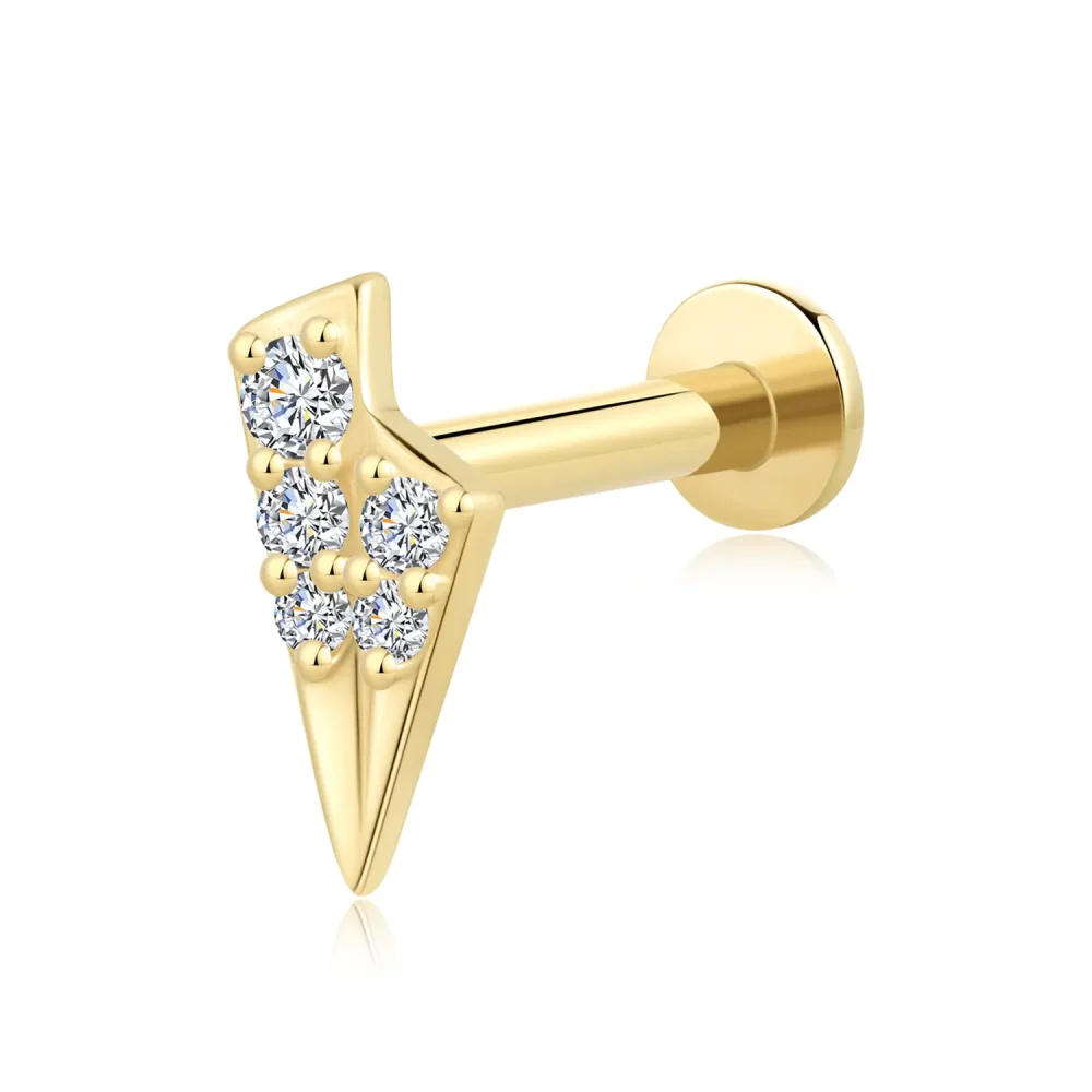 Introducing GV163G: A 14K Solid Gold Labret Stud with an arrowhead design, featuring clustered CZ stones for a sharp, stylish impact.